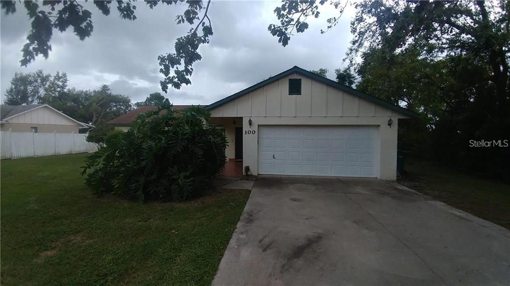 a view of backyard of house