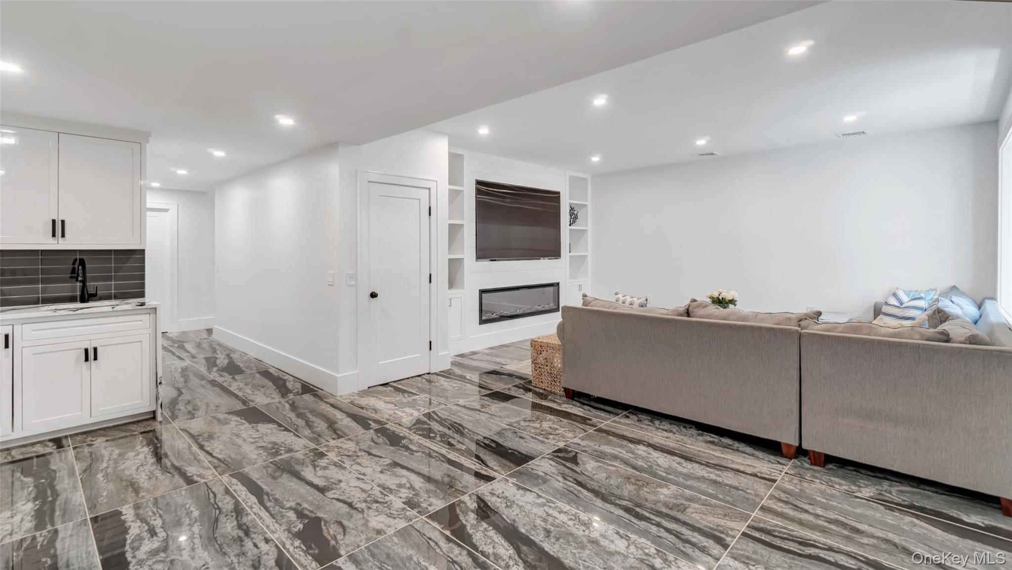 37 Wakeman Road Hampton Bays, NY 11946 - Photo 16 of 23 a room with storage and utility