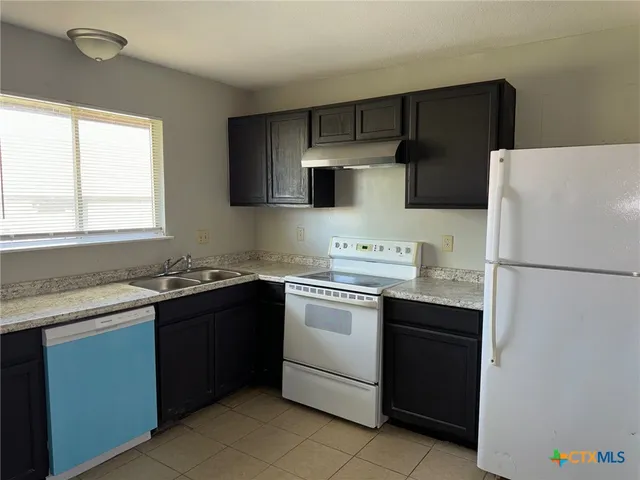 a view of a hallway with closet area