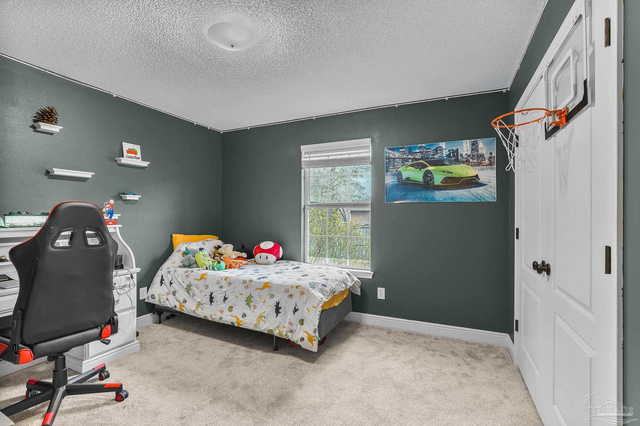 1089 Yellowstone Pass Cantonment, FL 32533 - Photo 32 of 45 a bedroom with a bed and a window