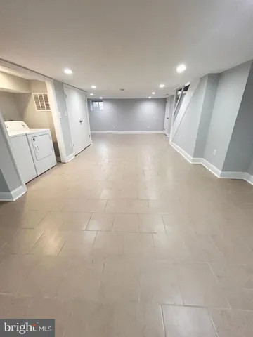 a view of hallway with a large window