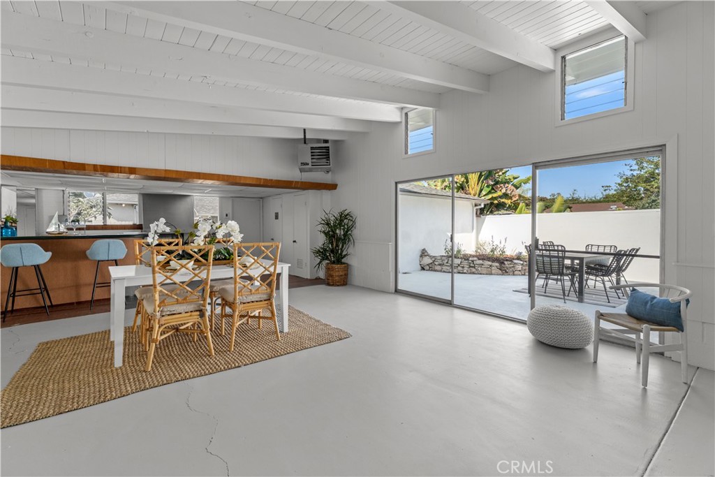 208 West Walnut Avenue El Segundo, CA 90245 - Photo 31 of 38 a dining room with furniture and a floor to ceiling window