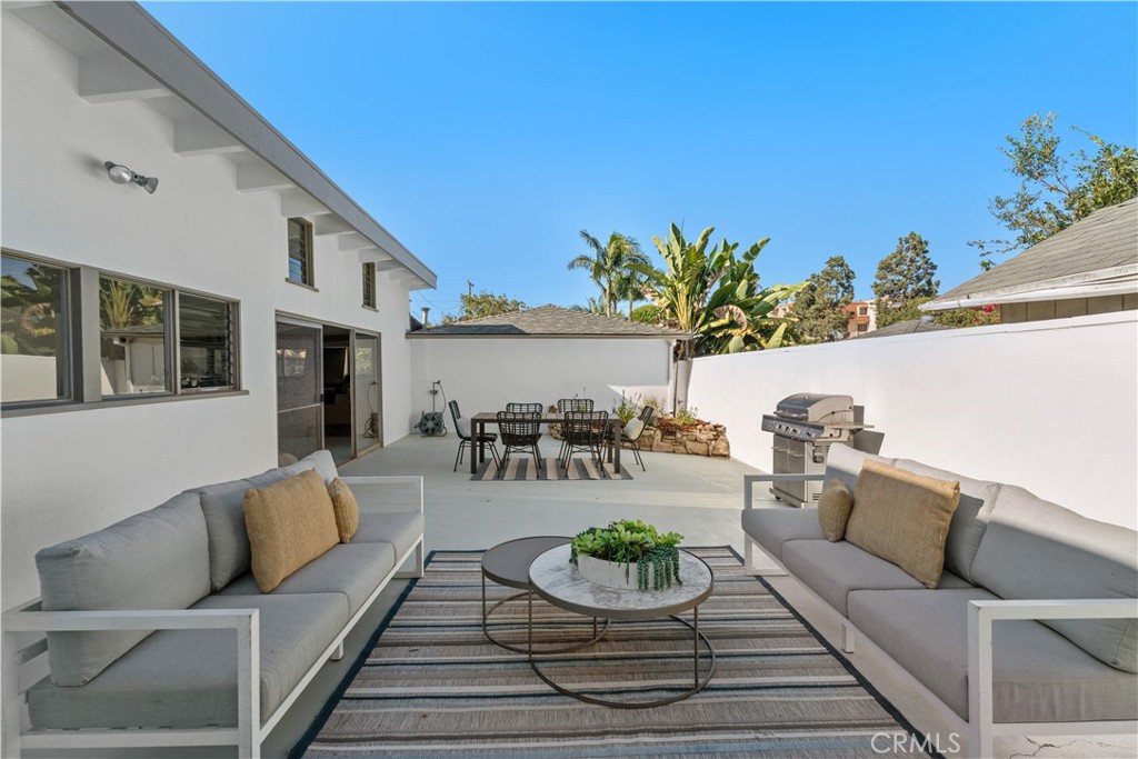 208 West Walnut Avenue El Segundo, CA 90245 - Photo 33 of 38 a living room with furniture and wooden floor