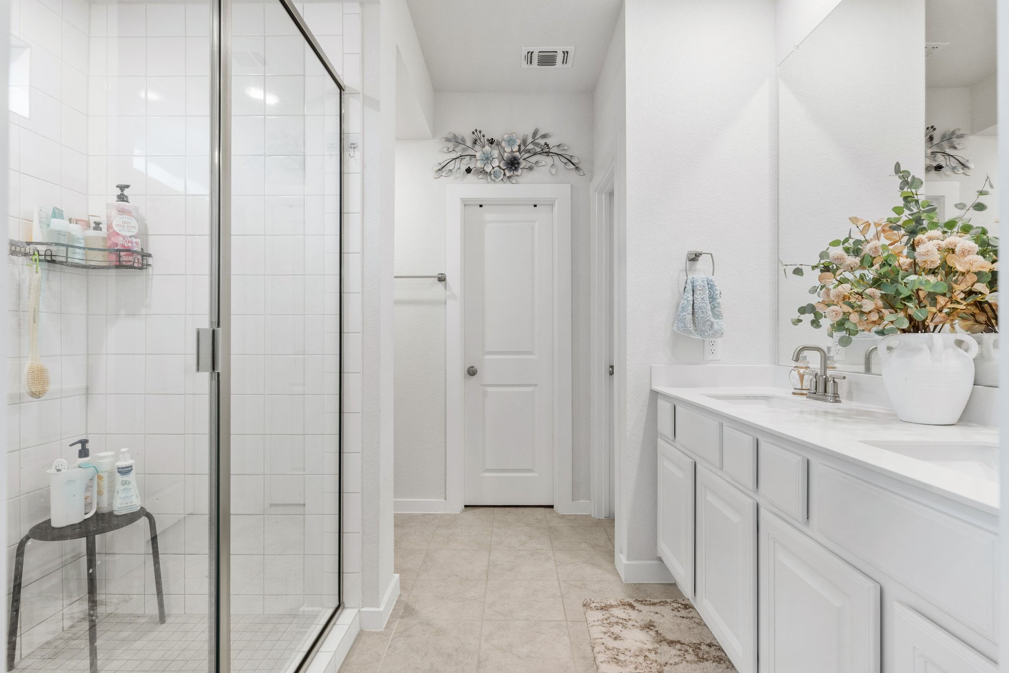 128 Three Oaks Lane Georgetown, TX 78628 - Photo 23 of 40 Full bathroom featuring double vanity, a stall shower, and light tile patterned flooring