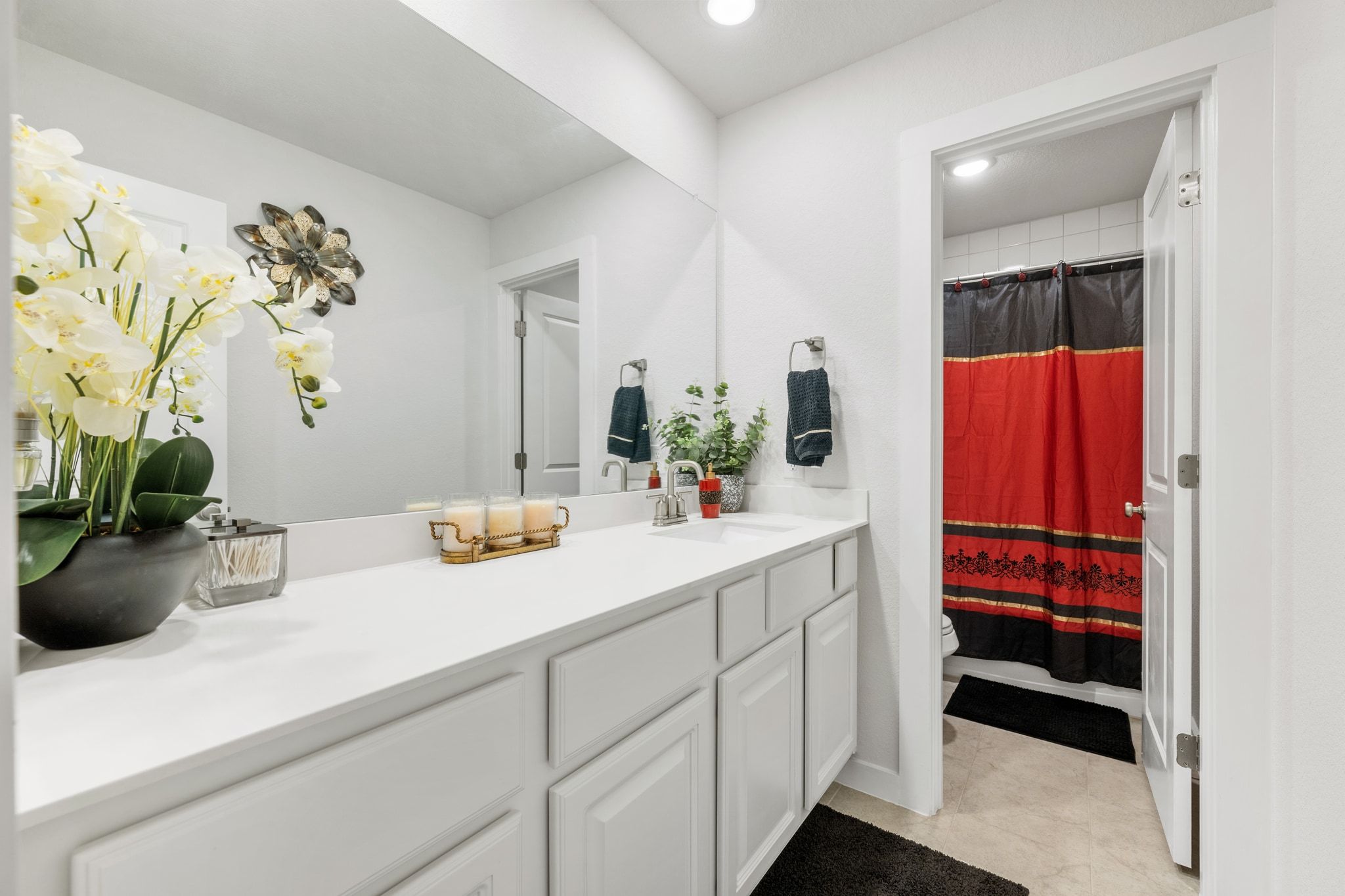 128 Three Oaks Lane Georgetown, TX 78628 - Photo 27 of 40 Full bathroom with curtained shower, vanity, light tile patterned flooring, and recessed lighting