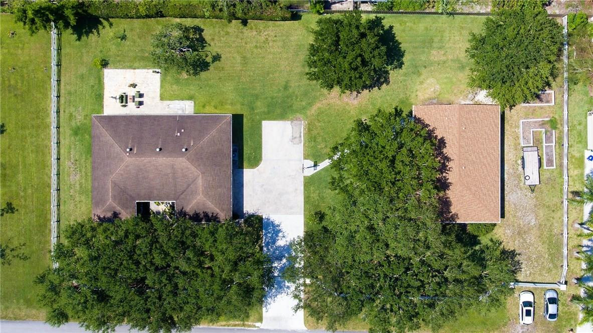 16800 Southwest 63rd Manor Southwest Ranches, FL 33331 - Photo 27 of 35 an aerial view of a house with outdoor space and lake view