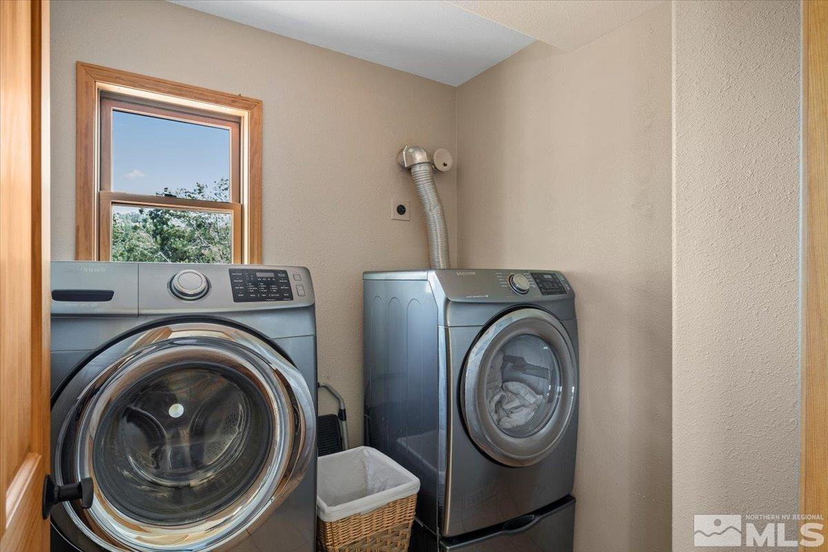 21470 Graves Road Reno, NV 89521 - Photo 22 of 37 a view of washer and dryer in a utility room