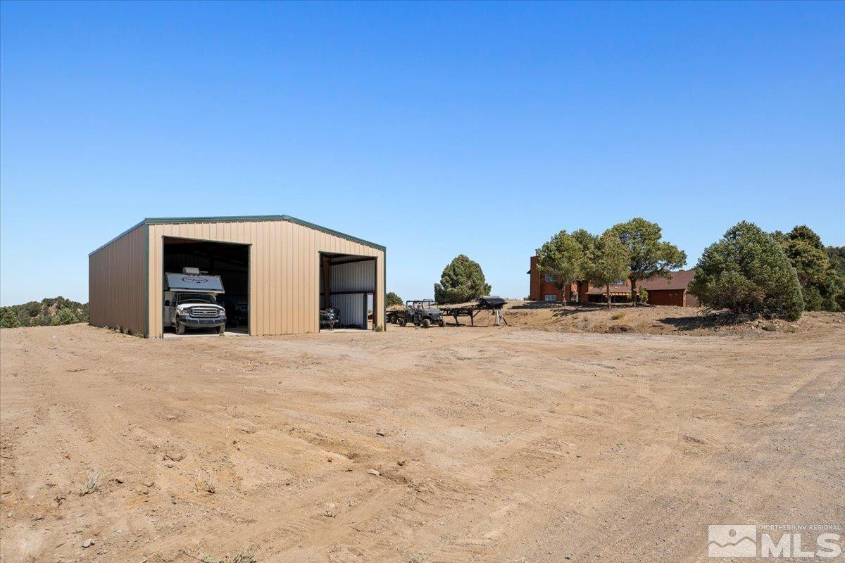 21470 Graves Road Reno, NV 89521 - Photo 24 of 37 a view of outdoor space and yard