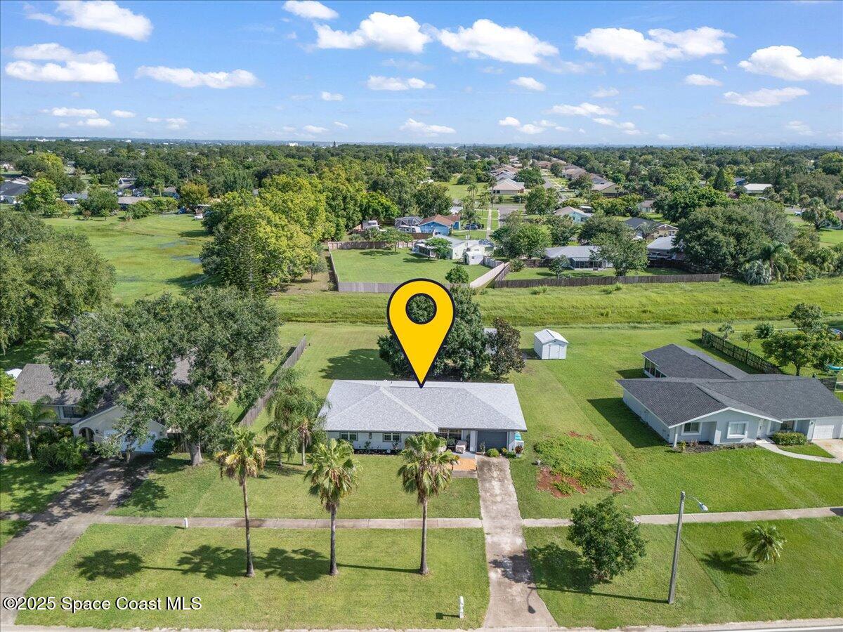 859 Riviera Drive Northeast Palm Bay, FL 32905 - Photo 4 of 26 a view of a city