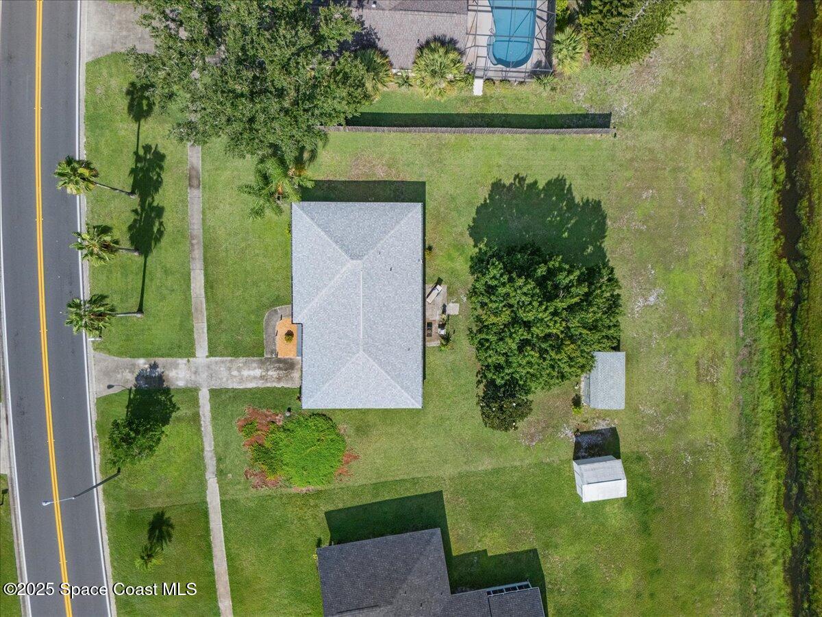 859 Riviera Drive Northeast Palm Bay, FL 32905 - Photo 5 of 26 an aerial view of a house with outdoor space
