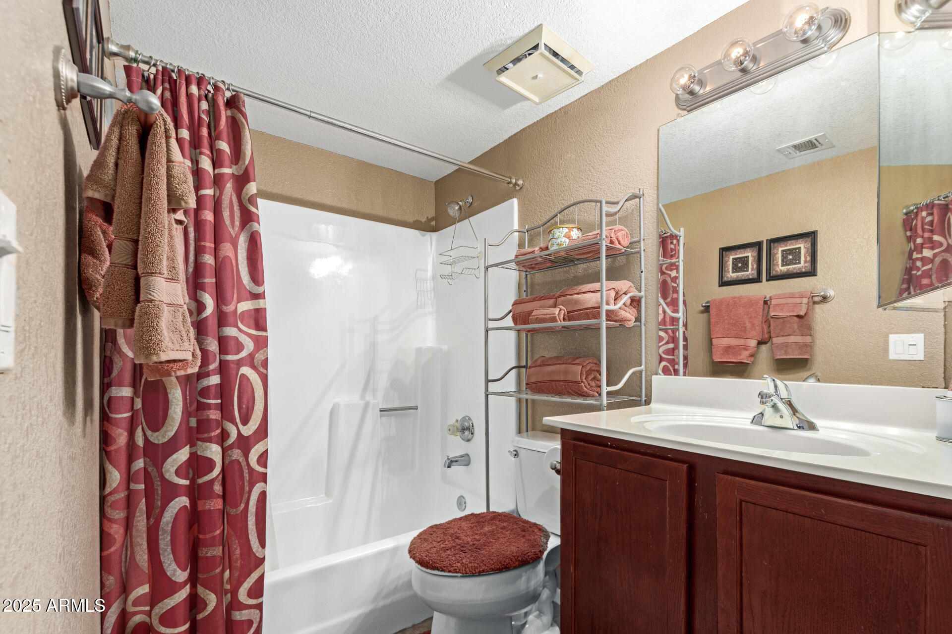 1720 East Thunderbird Road, Unit 2059 Phoenix, AZ 85022 - Photo 12 of 24 a bathroom with a sink toilet and shower