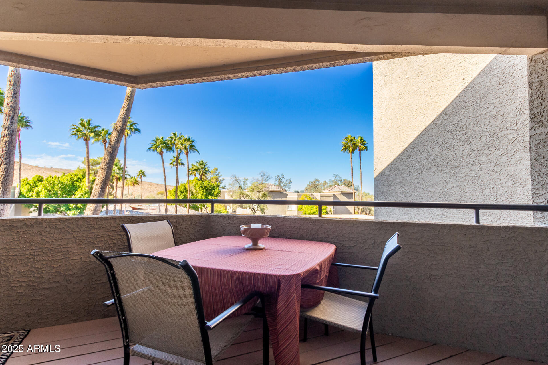 1720 East Thunderbird Road, Unit 2059 Phoenix, AZ 85022 - Photo 14 of 24 a view of a chairs and table in patio