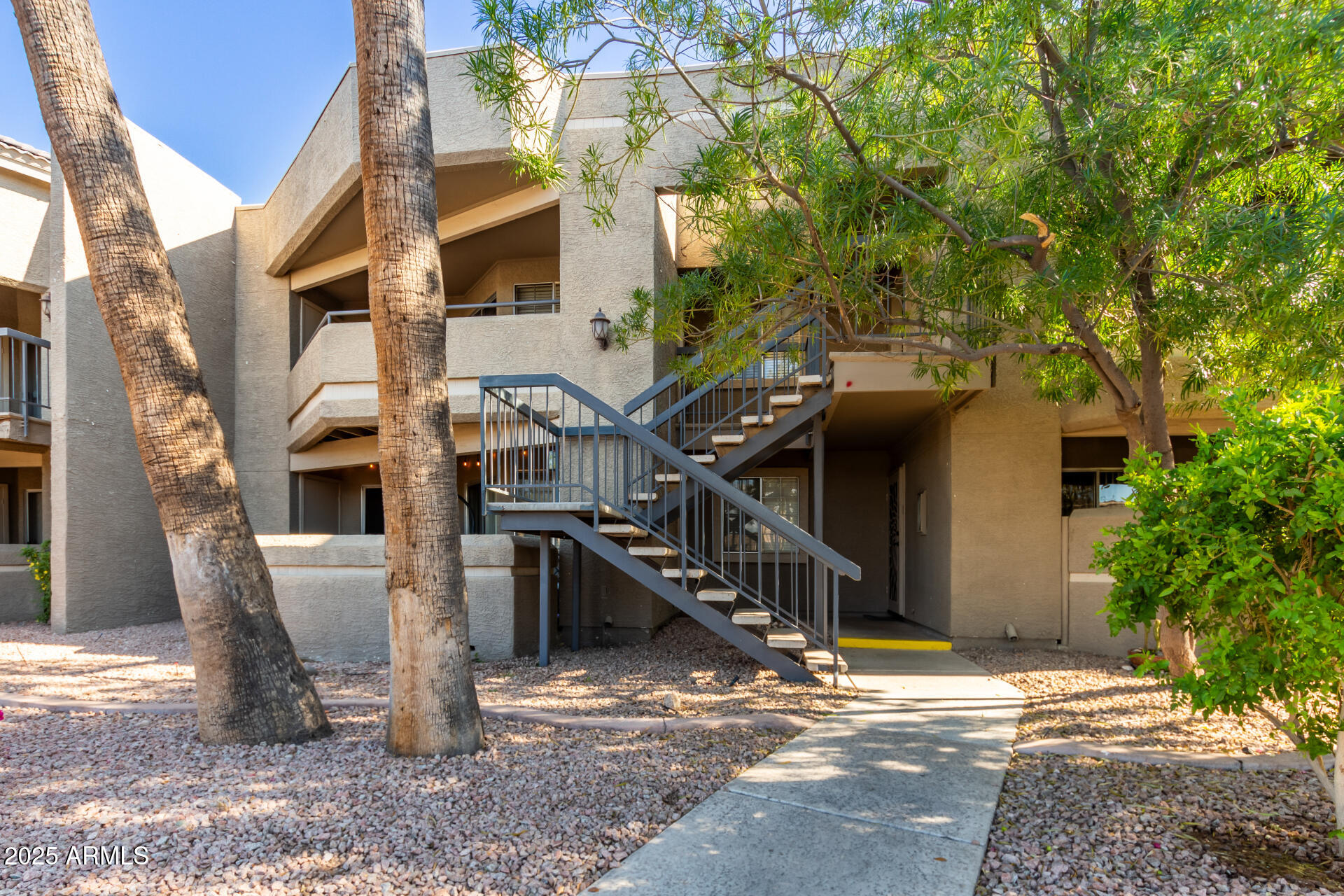 1720 East Thunderbird Road, Unit 2059 Phoenix, AZ 85022 - Photo 17 of 24 a view of a house with a patio