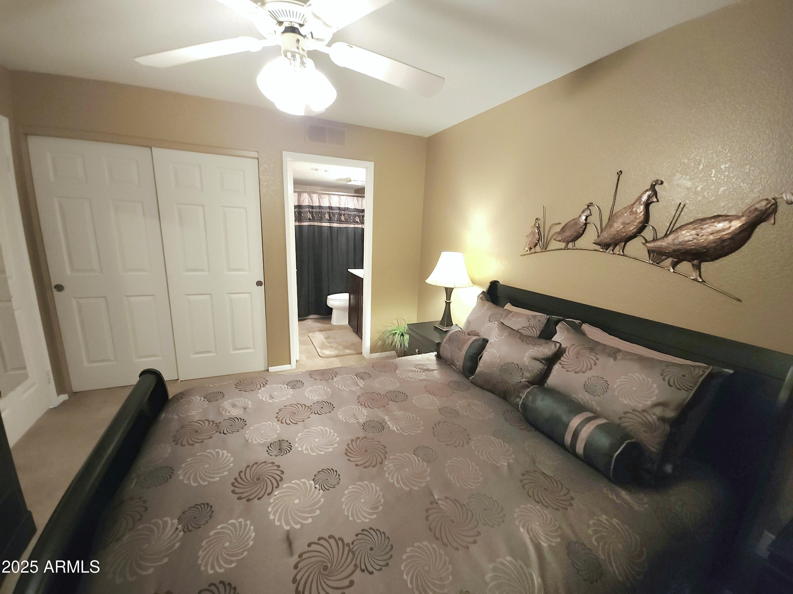 1720 East Thunderbird Road, Unit 2059 Phoenix, AZ 85022 - Photo 7 of 24 a bedroom with a bed and window