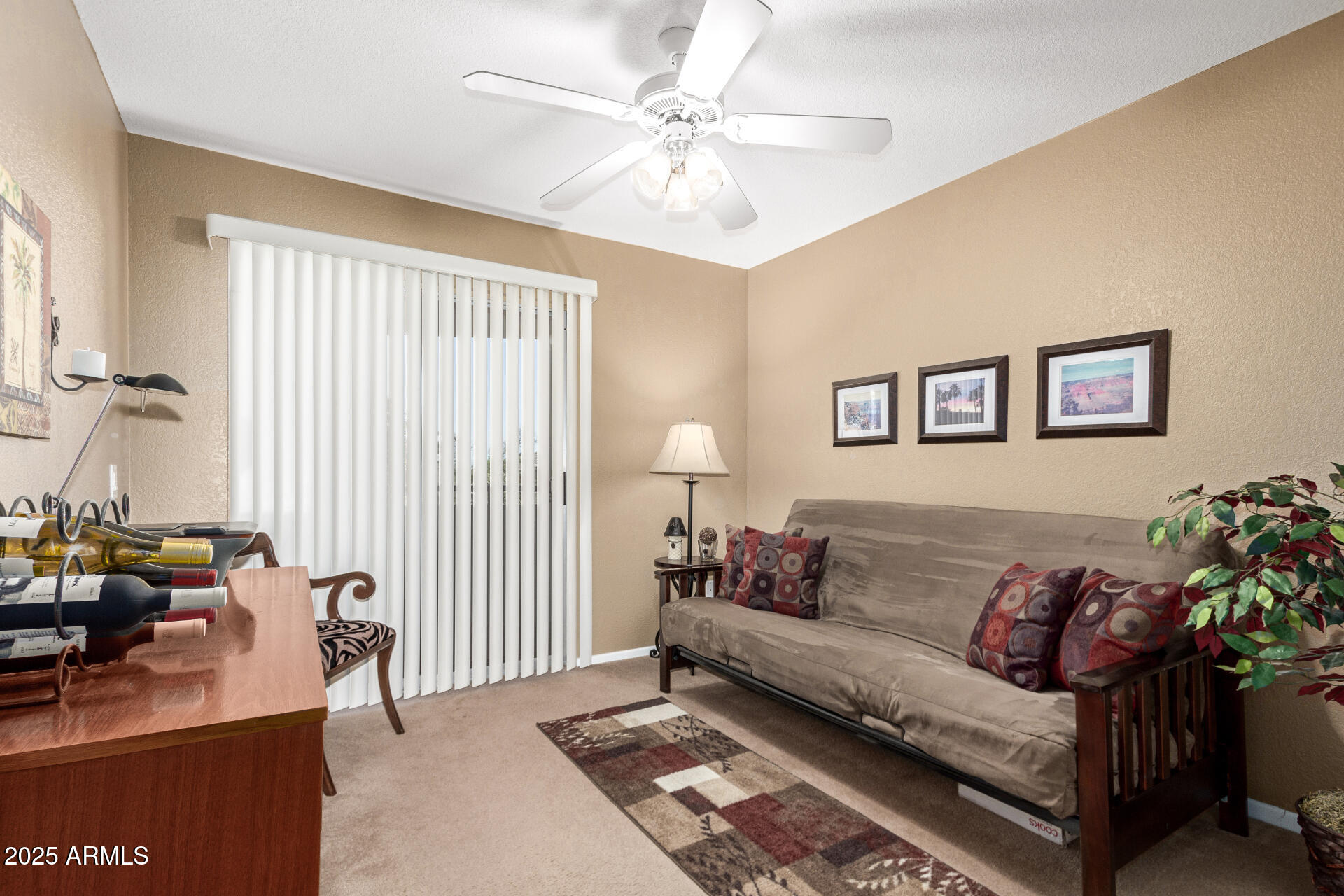 1720 East Thunderbird Road, Unit 2059 Phoenix, AZ 85022 - Photo 10 of 24 a living room with furniture and a large window