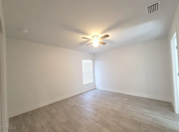 a view of a room with racks on the wall