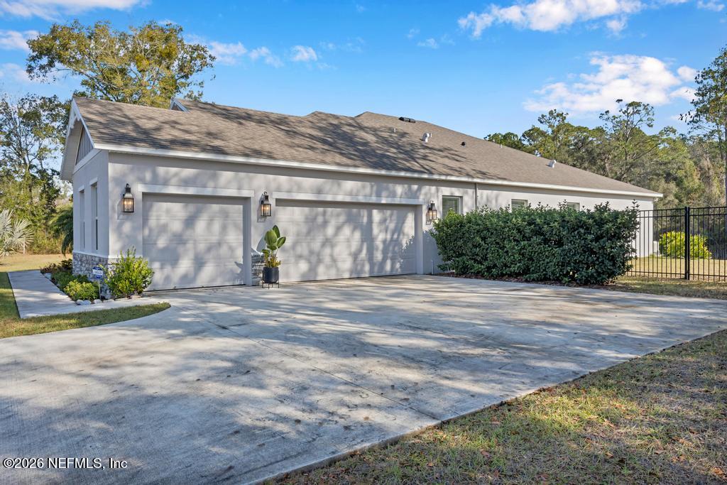 1479 Lake Foxmeadow Road Middleburg, FL 32068 - Photo 4 of 45 Side Entry 3 Car Garage