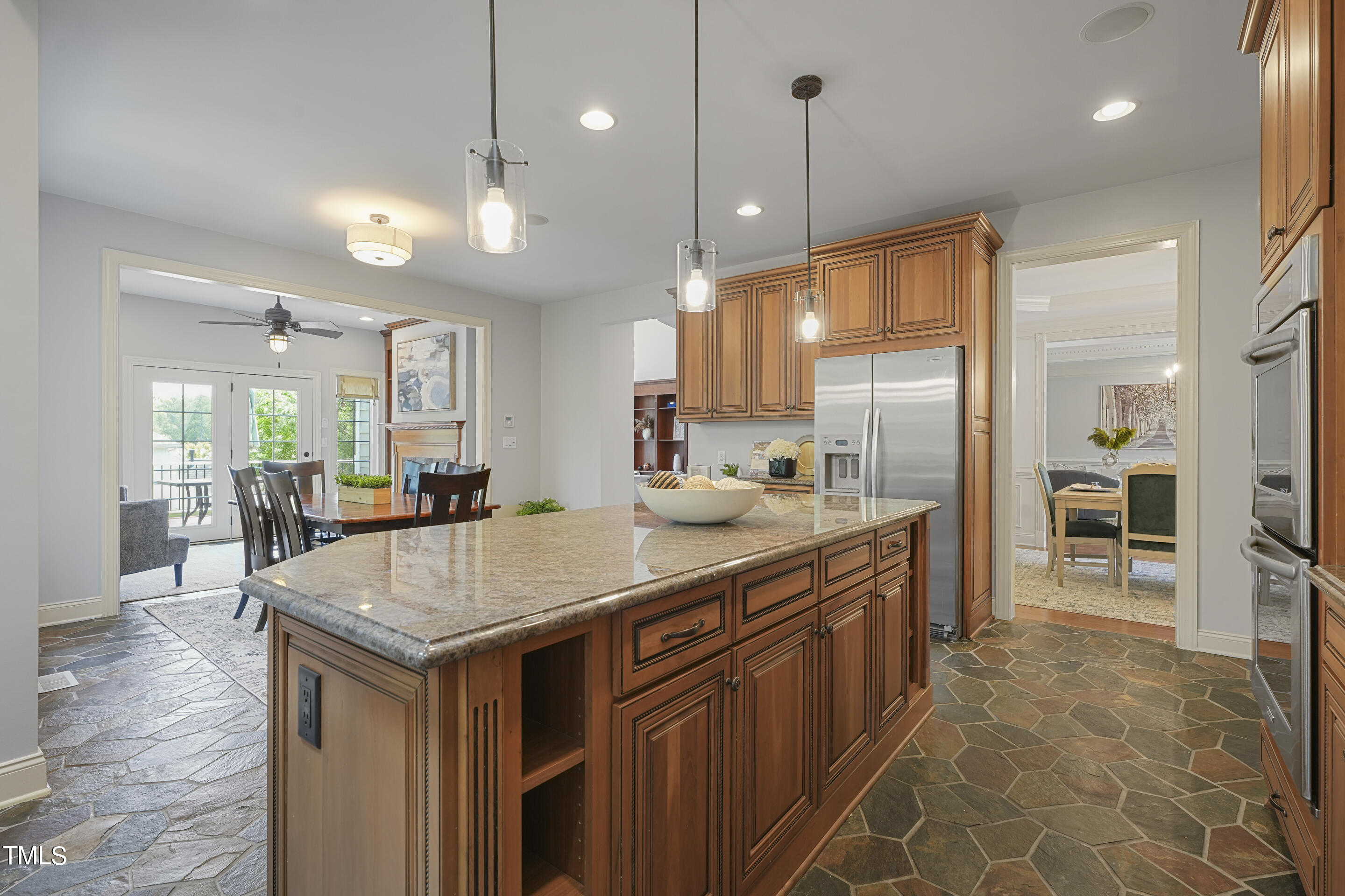401 South Bend Drive Durham, NC 27713 - Photo 11 of 65 a kitchen with kitchen island a sink stove and refrigerator