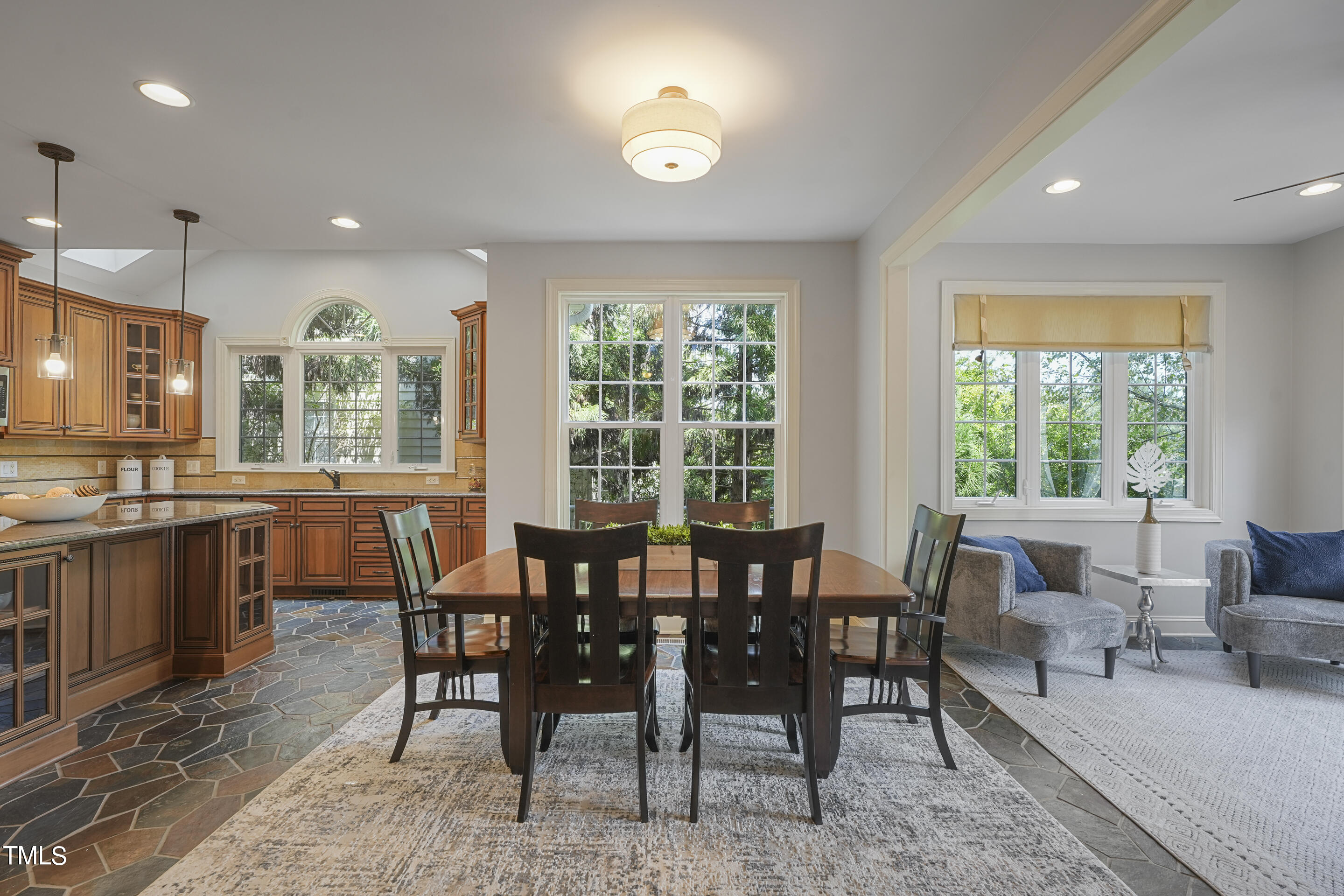 401 South Bend Drive Durham, NC 27713 - Photo 14 of 65 a view of a dining room with furniture window and outside view