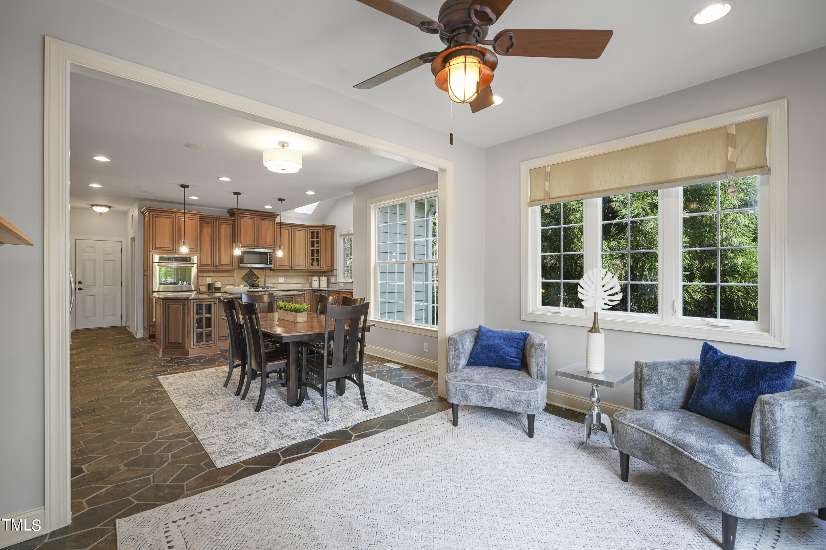 401 South Bend Drive Durham, NC 27713 - Photo 17 of 65 a view of a dining room with furniture window and outside view