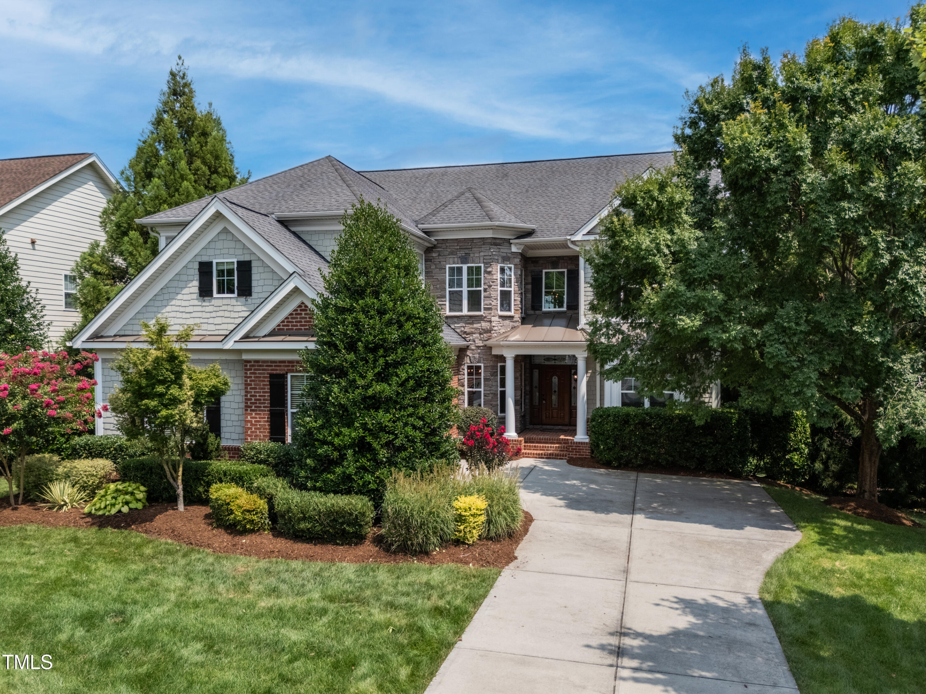 401 South Bend Drive Durham, NC 27713 - Photo 2 of 65 a front view of house with yard and green space