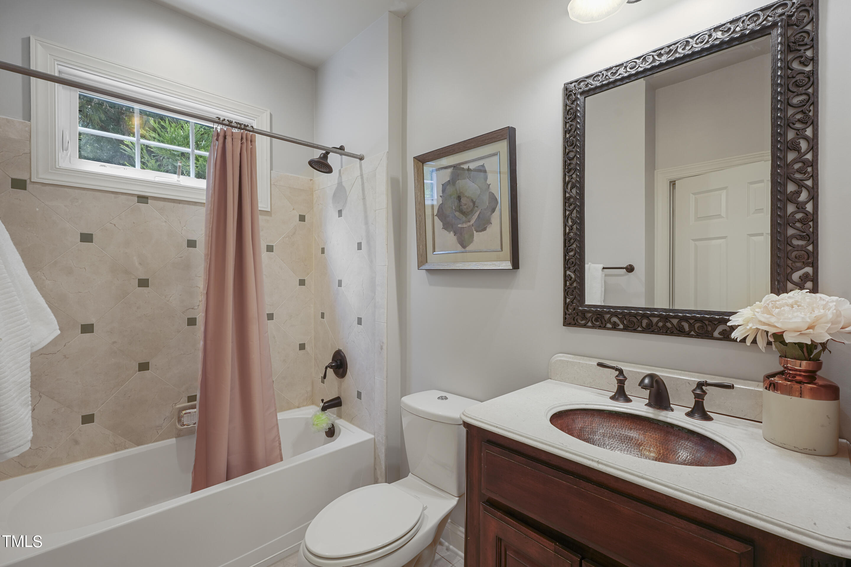 401 South Bend Drive Durham, NC 27713 - Photo 22 of 65 a bathroom with a sink toilet a mirror and shower