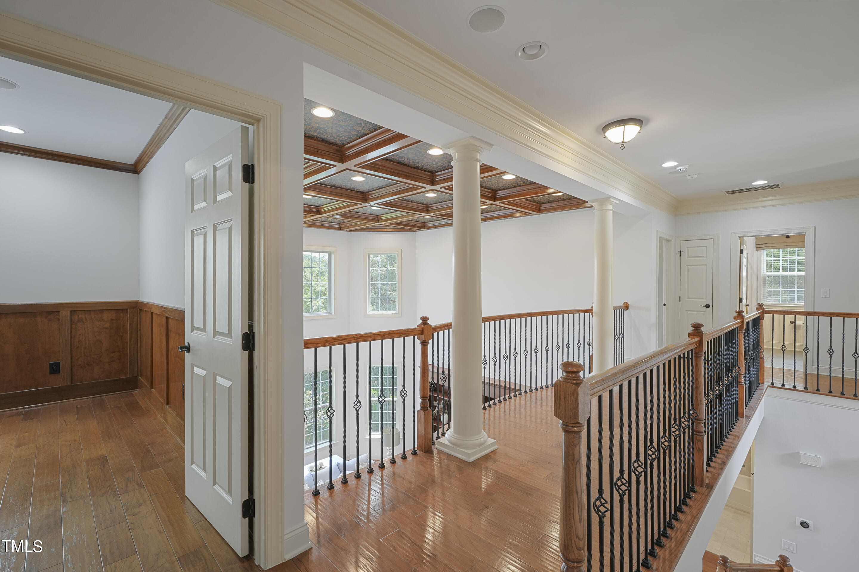 401 South Bend Drive Durham, NC 27713 - Photo 25 of 65 a view of a hallway with wooden floor and windows