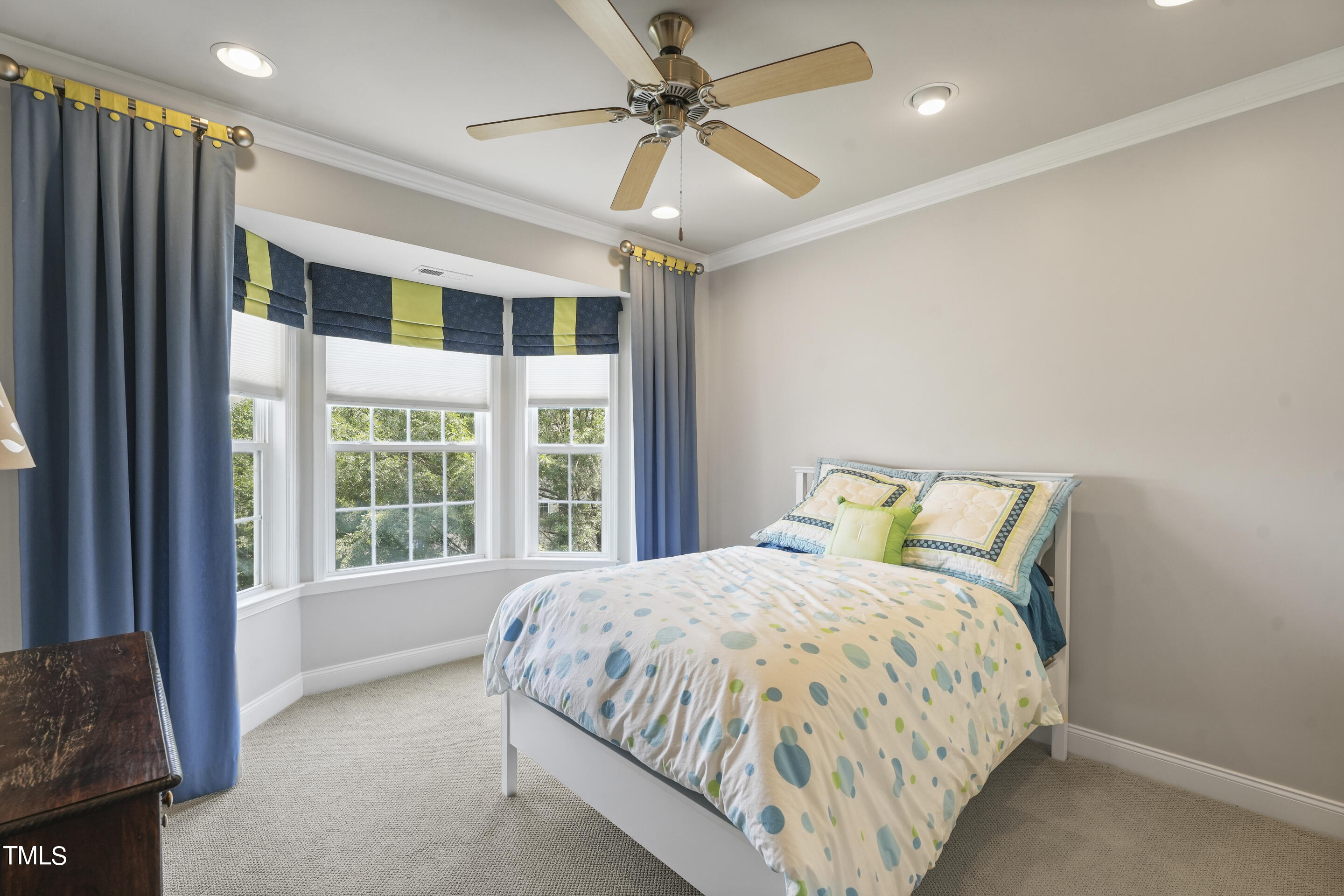 401 South Bend Drive Durham, NC 27713 - Photo 39 of 65 a bed sitting in a spacious bedroom next to a window
