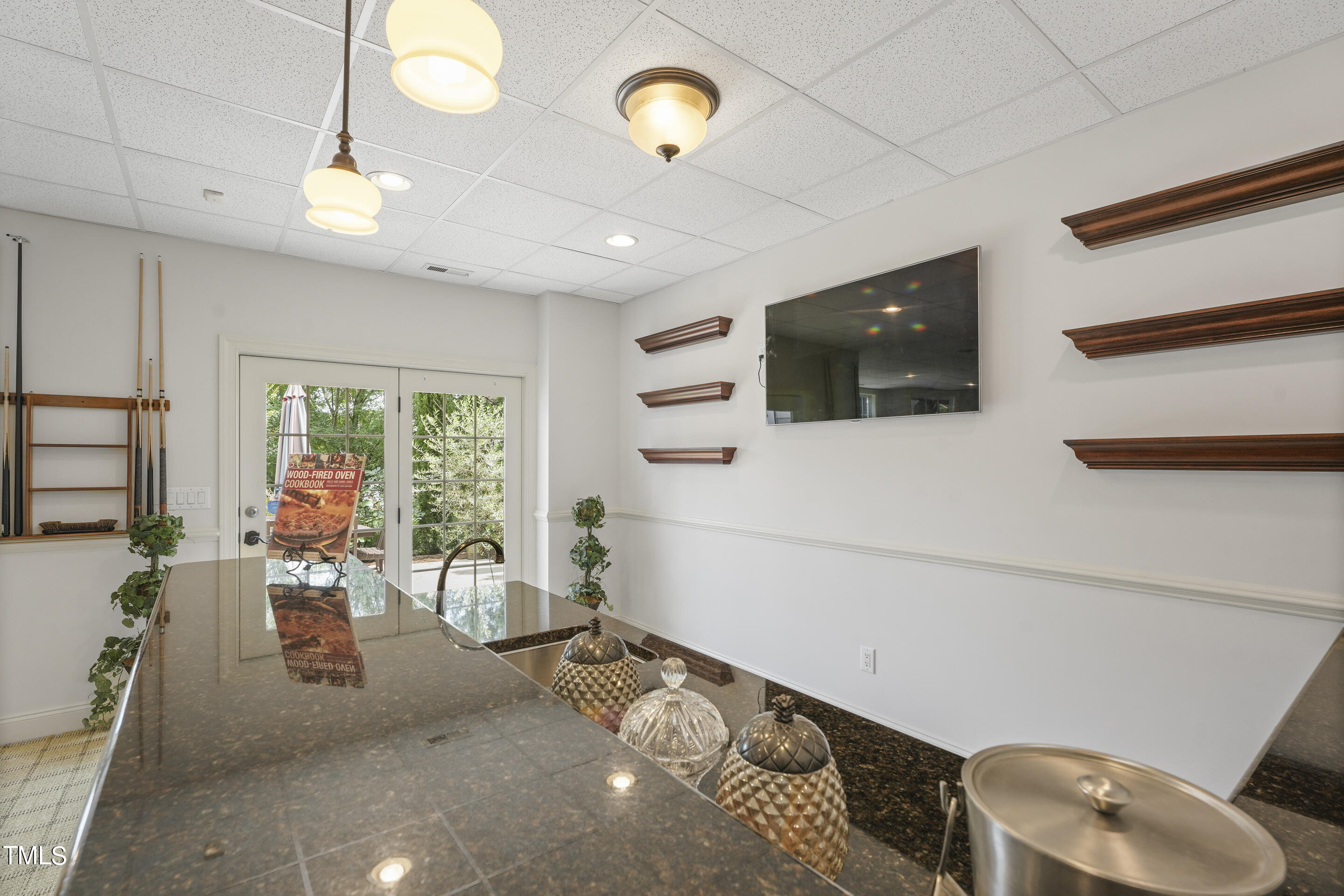 401 South Bend Drive Durham, NC 27713 - Photo 51 of 65 a view of a livingroom with furniture and a flat screen tv