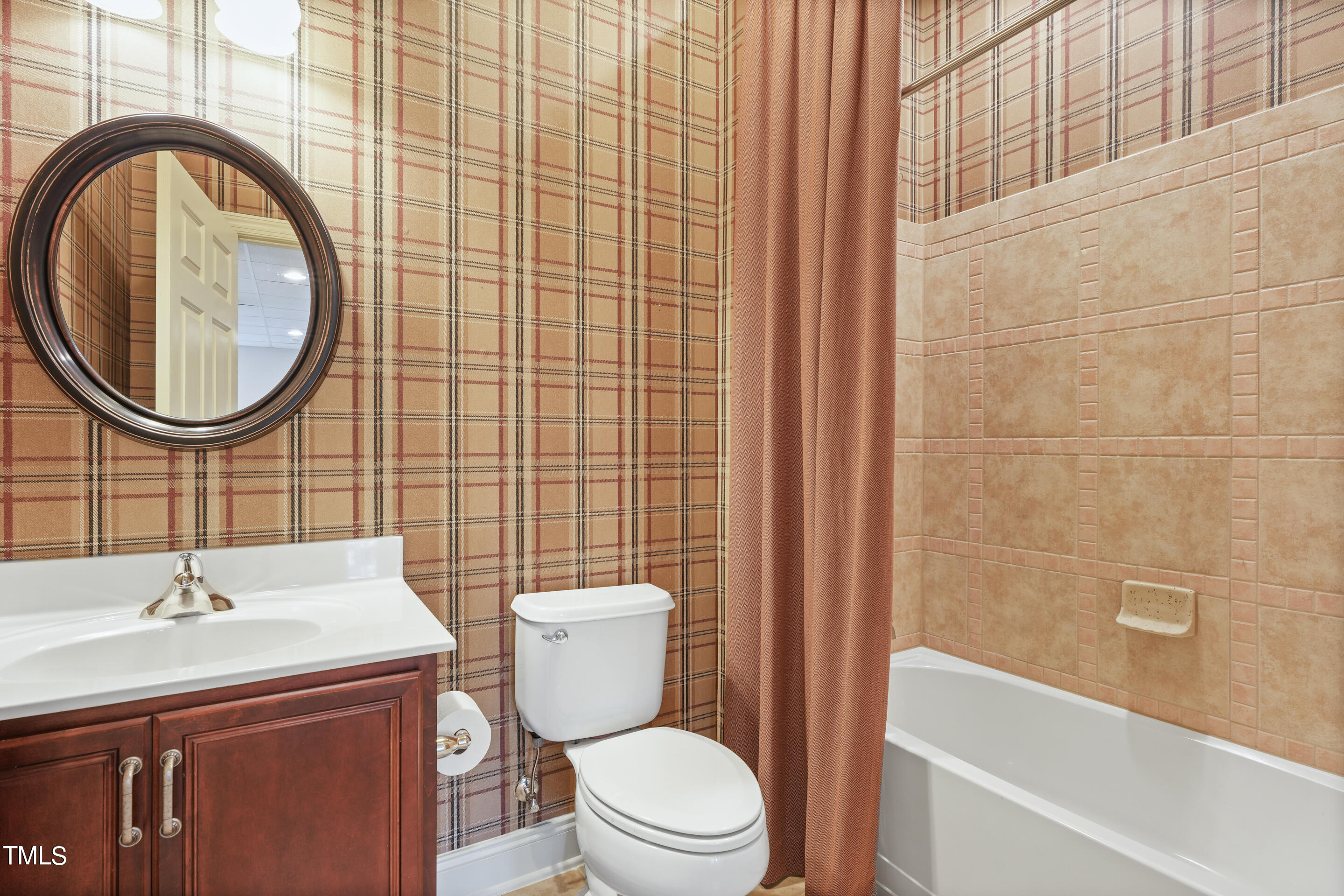 401 South Bend Drive Durham, NC 27713 - Photo 52 of 65 a bathroom with a sink a toilet and a mirror