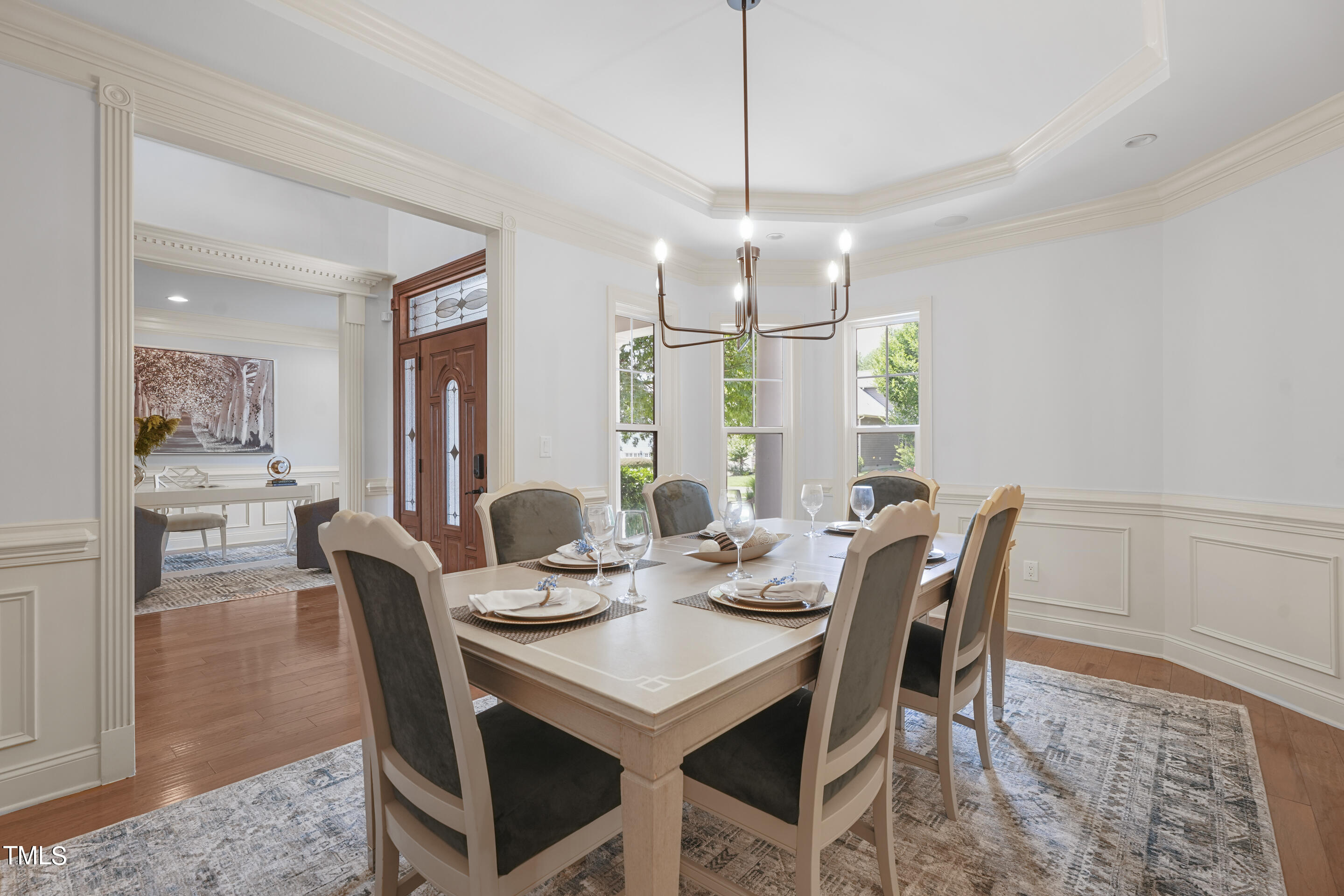 401 South Bend Drive Durham, NC 27713 - Photo 8 of 65 a view of a dining room with furniture window and wooden floor