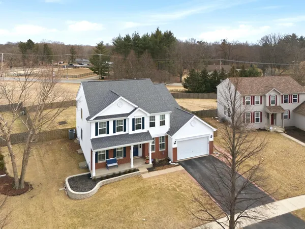 a view of a house with roof deck