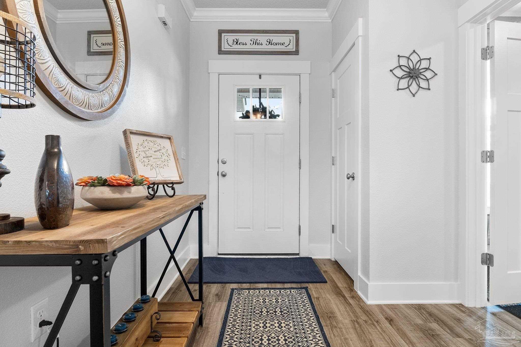 4483 Jude Way Pace, FL 32571 - Photo 4 of 30 a view of a hallway with washer and dryer