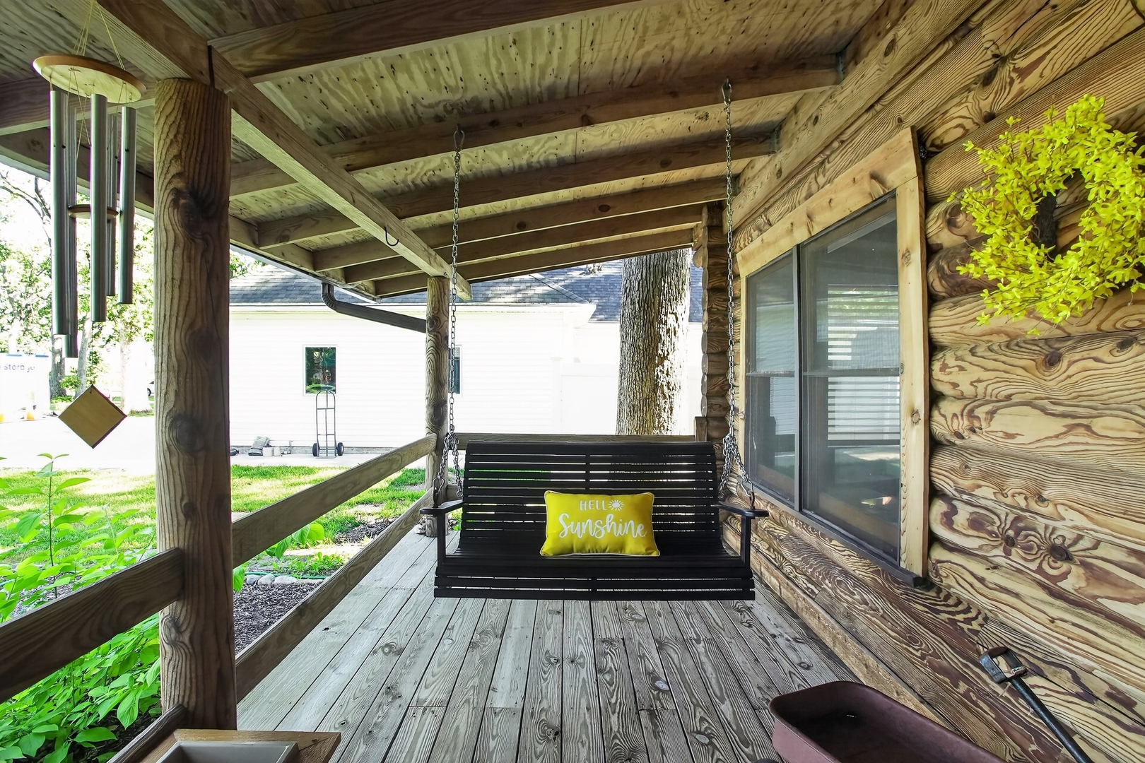 4615 East 2619th Road Sandwich, IL 60548 - Photo 6 of 36 a view of a porch with wooden floor and outdoor space