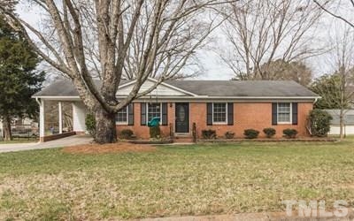 102 Rolling Ridge Circle Garner, NC 27529 - Photo 1 of 23 a front view of a house with a garden