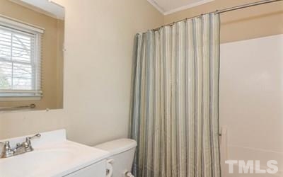 102 Rolling Ridge Circle Garner, NC 27529 - Photo 14 of 23 a bathroom with a sink and toilet