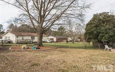 102 Rolling Ridge Circle Garner, NC 27529 - Photo 18 of 23 a view of road with large trees