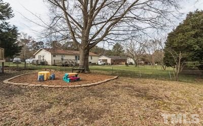 102 Rolling Ridge Circle Garner, NC 27529 - Photo 20 of 23 a view of outdoor space with garden