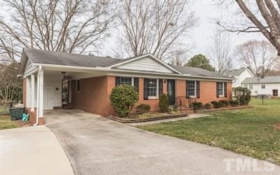 102 Rolling Ridge Circle Garner, NC 27529 - Photo 22 of 23 a front view of a house with yard patio and green space
