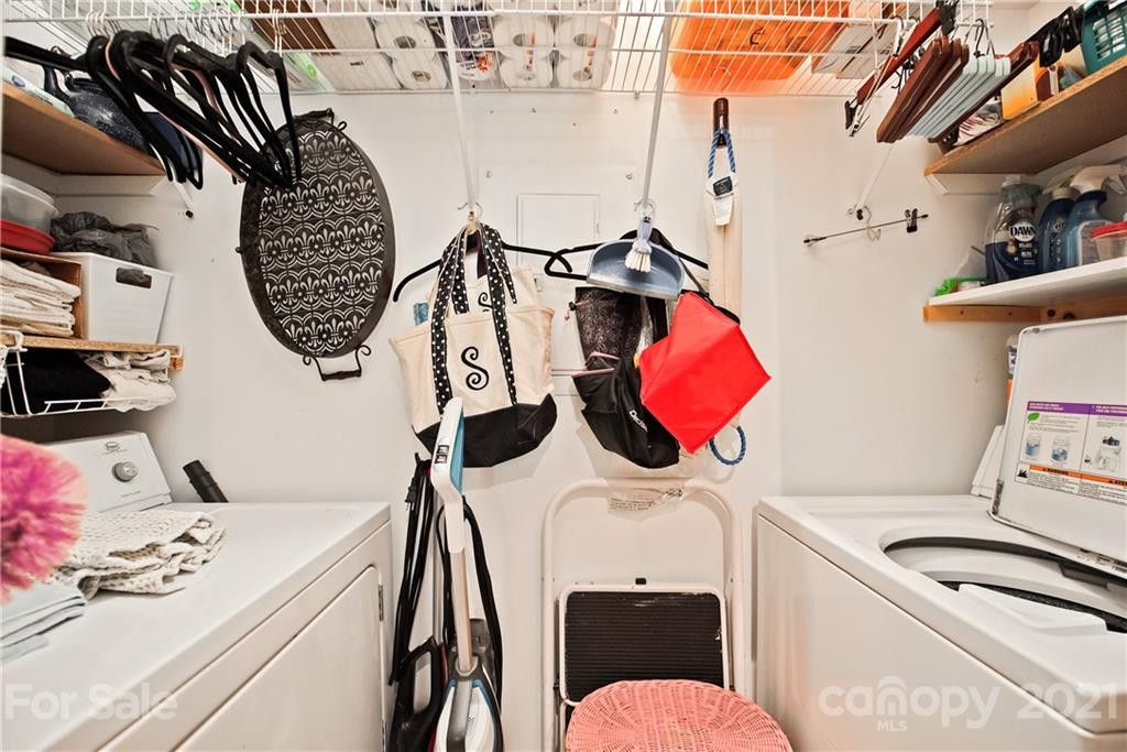 18809 Nautical Drive, Unit 302 Cornelius, NC 28031 - Photo 18 of 22 a bathroom with a sink vanity mirror and toilet