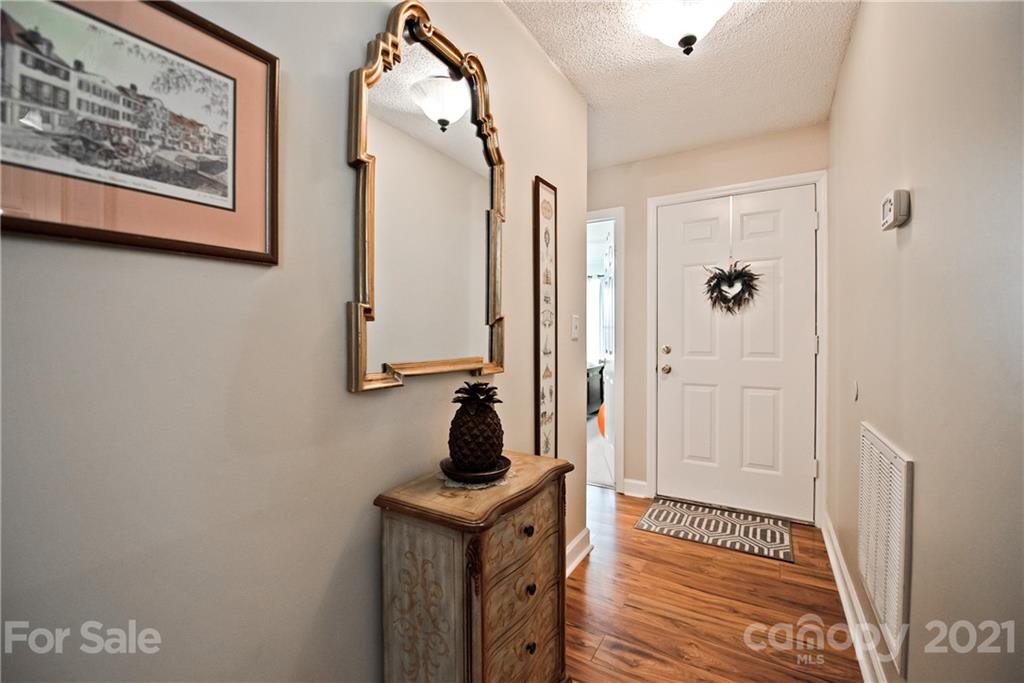 18809 Nautical Drive, Unit 302 Cornelius, NC 28031 - Photo 4 of 22 a bathroom with a sink and a mirror