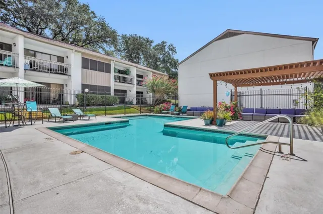 a front view of building with yard