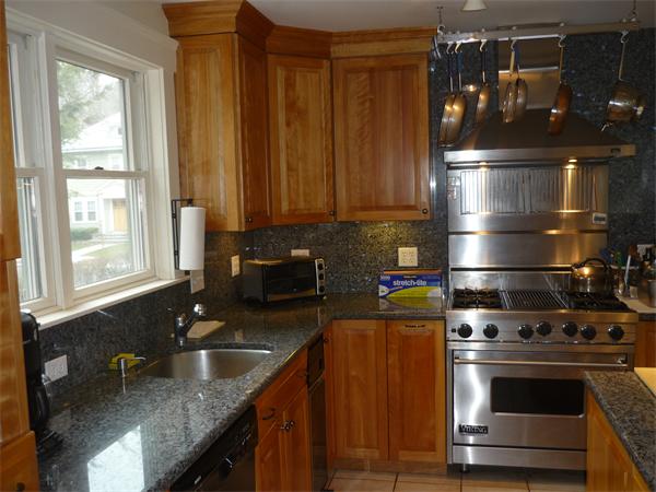 238 Clark Road Brookline, MA 02445 - Photo 3 of 17 a kitchen with a stove and a sink