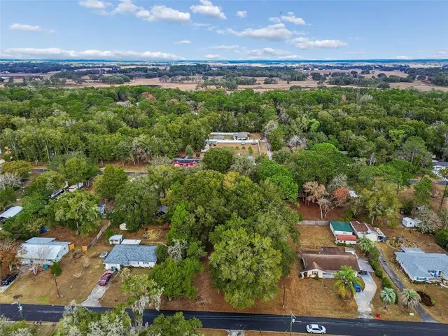 an aerial view of residential building with outdoor space