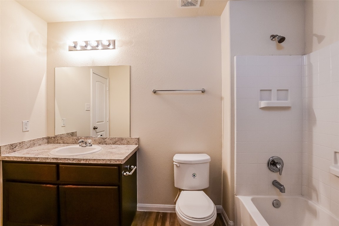5506 Paiges Way Katy, TX 77449 - Photo 11 of 17 a bathroom with a sink a toilet and shower