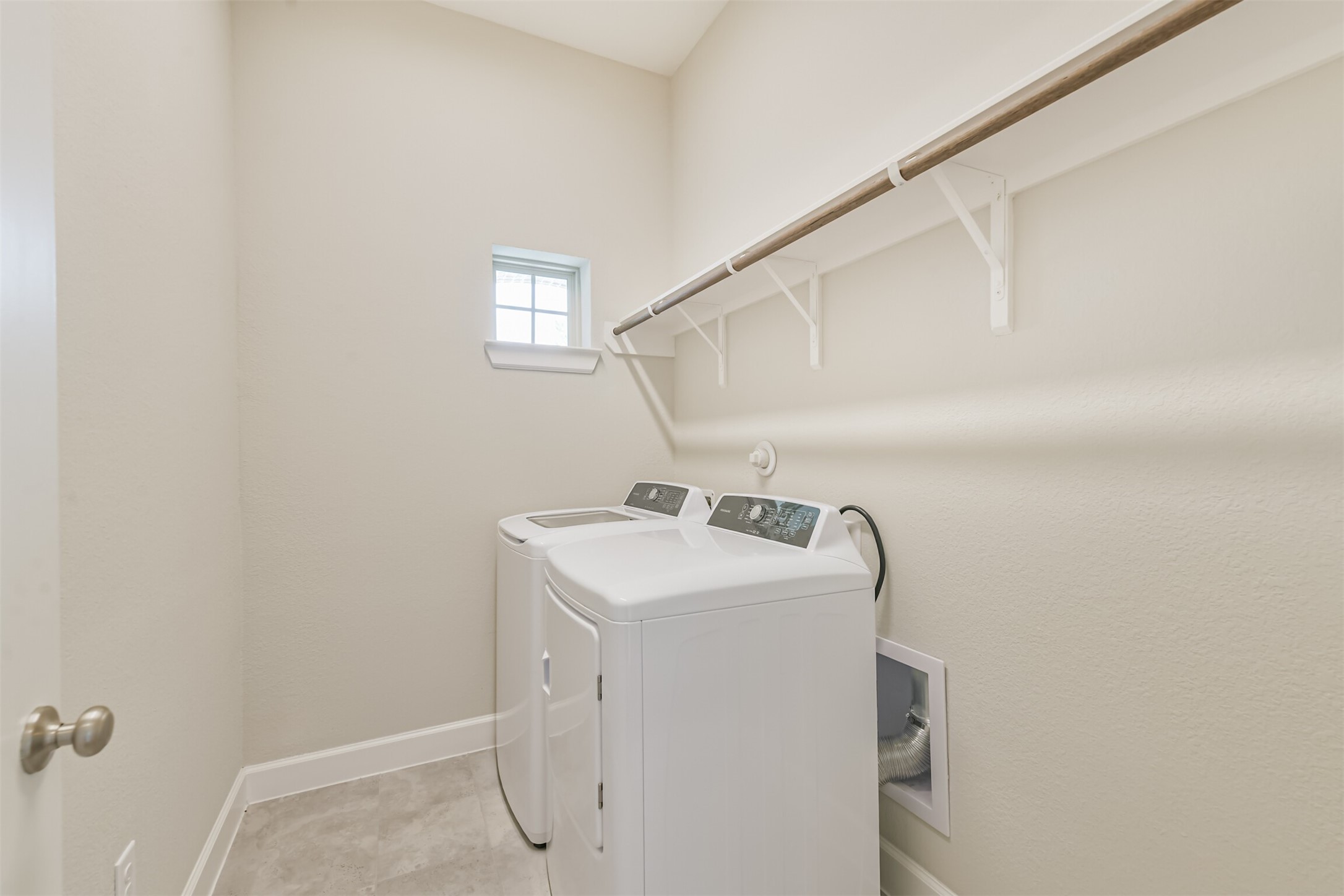 15611 Rising Wren Court Conroe, TX 77302 - Photo 37 of 38 a utility room with dryer and washer