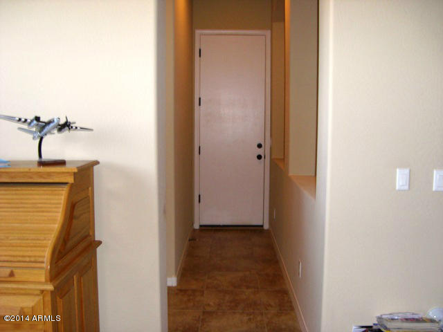 16922 North Palo Rojo Road Maricopa, AZ 85138 - Photo 9 of 42 09 - Hallway 1 to 1 Car Garage