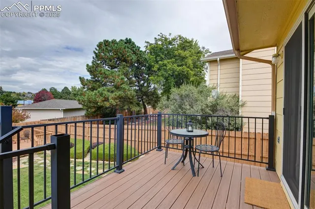 a view of a backyard with sitting area