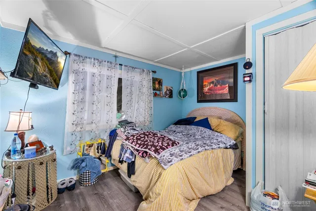 a bathroom with a sink and mirror with toilet