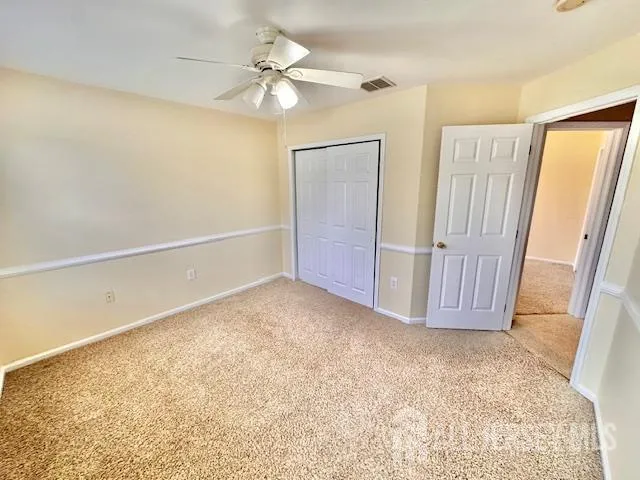 a view of a backyard with sitting area